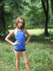 small girl in shorts