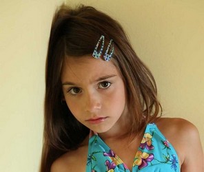 small girl in shorts