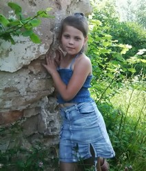 small girl in shorts